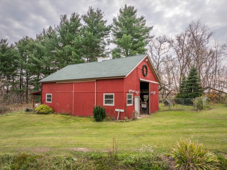 Red barn with water, electric and hay storage