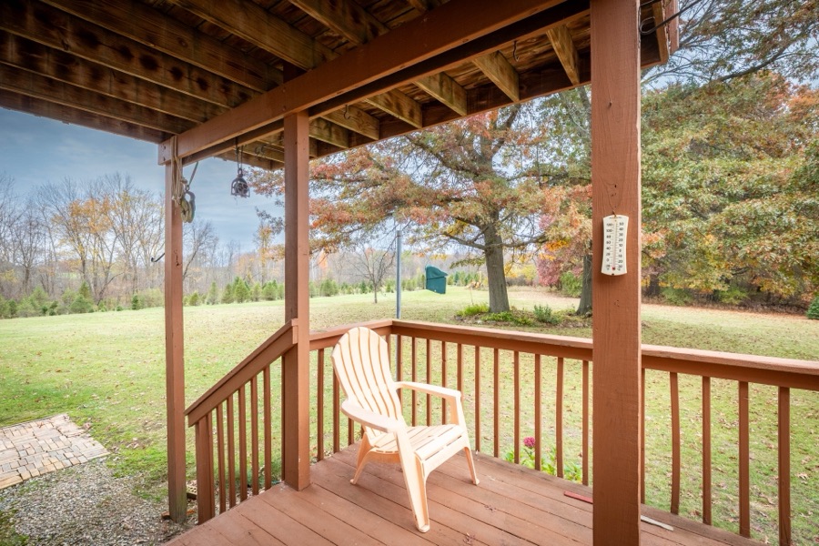 Covered porch looking over the lawn